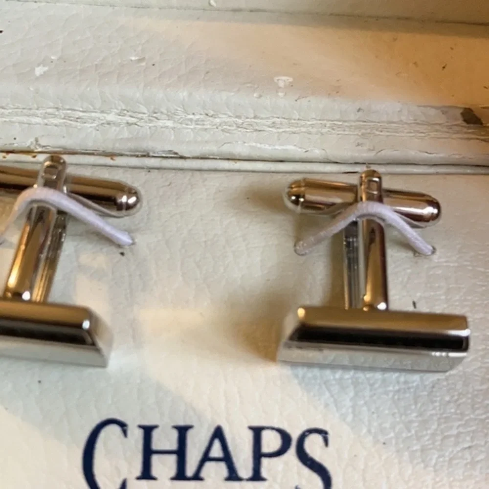 Chaps men’s silver tone cuff links with black inlaid stripes